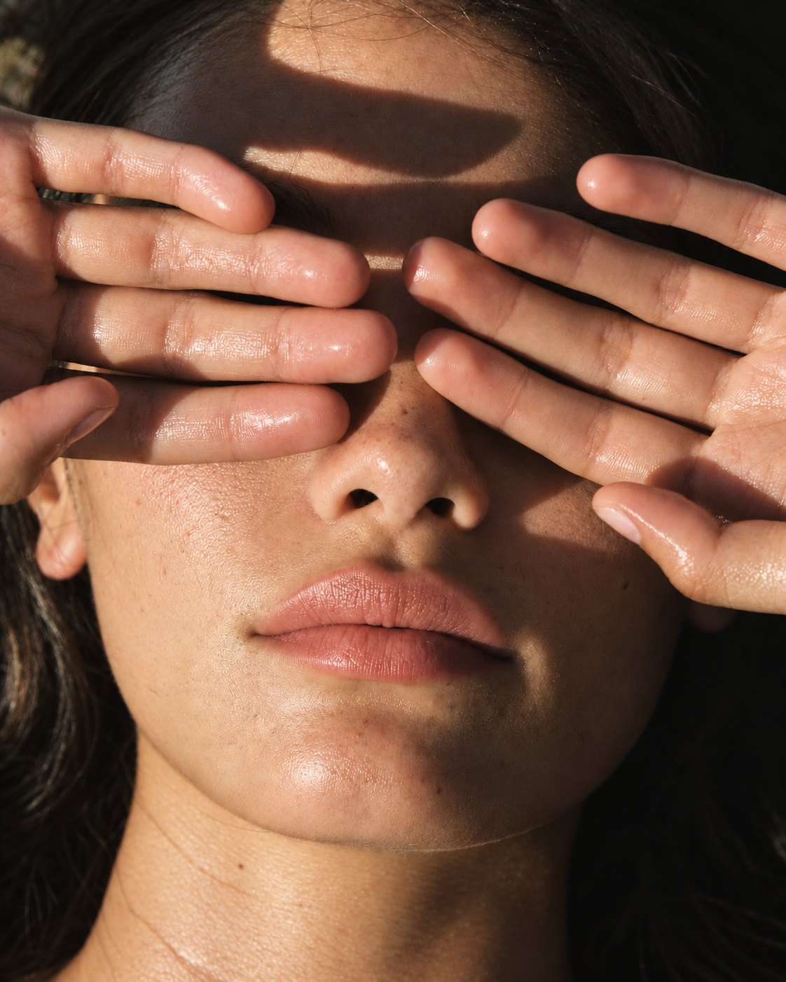 Sunlit close-up of glowing skin